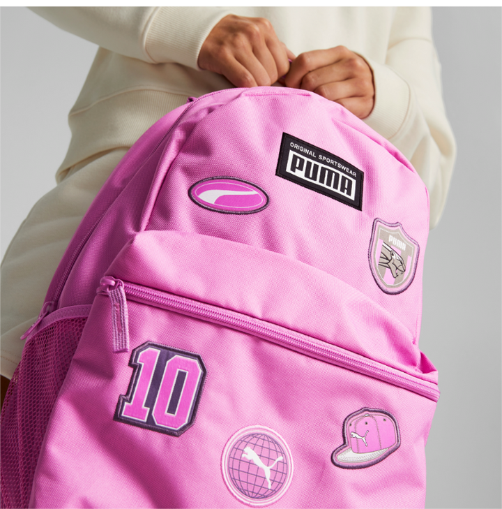 Pink Puma backpack with sporty patches and front zip pocket, durable and practical for school and casual use