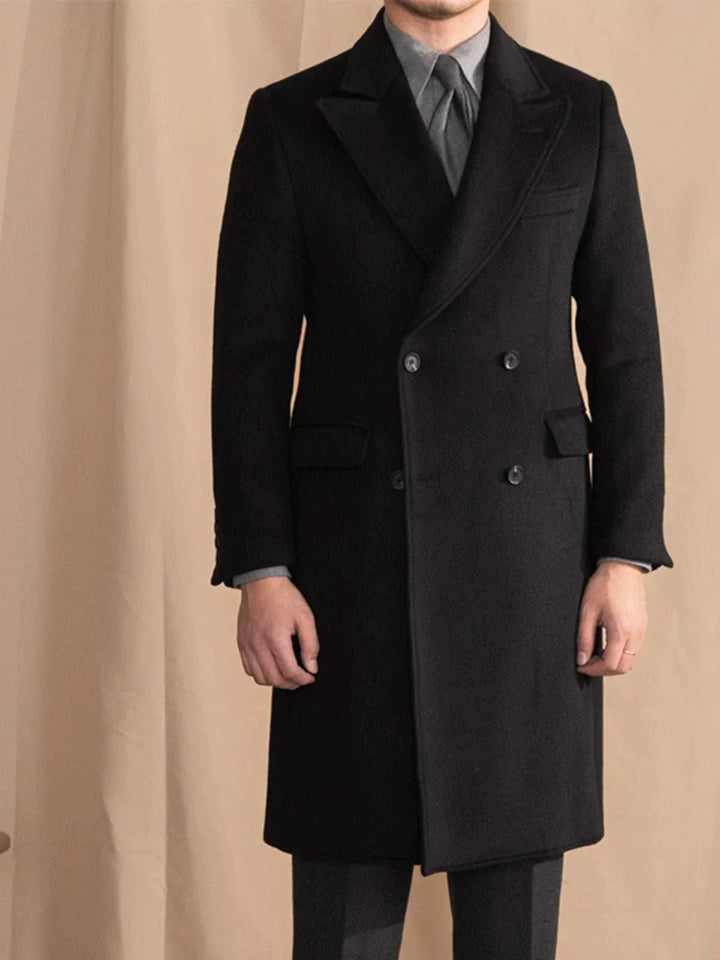 Mr. Lusan gentleman black double-breasted British wool coat with peaked lapels and flap pockets