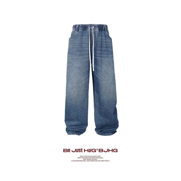 Wide loose fit blue denim jeans with white drawstring waistband designed for comfort and style, featuring heavy fabric and casual streetwear appeal.