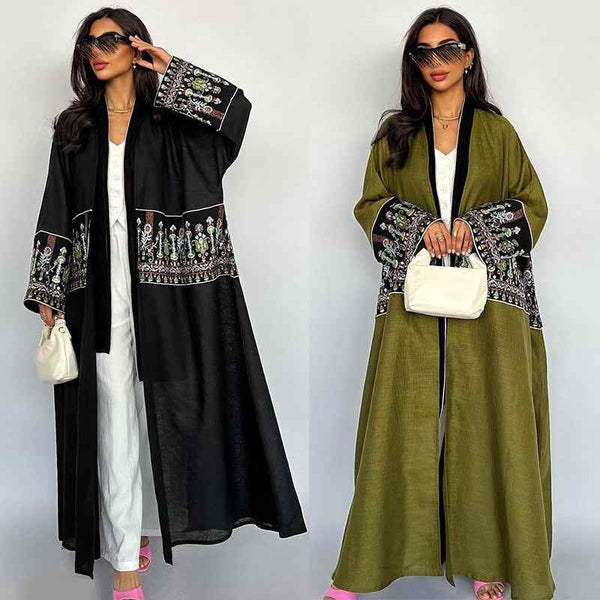 Elegant embroidered Middle Eastern abaya with traditional design, available in various colors.