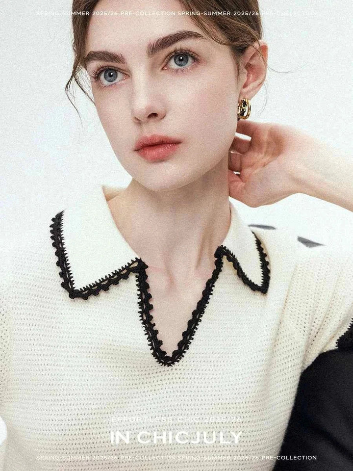 Elegant CHICJULY blouse in white with black trim, V-neck, spring-summer 2025/26 collection.