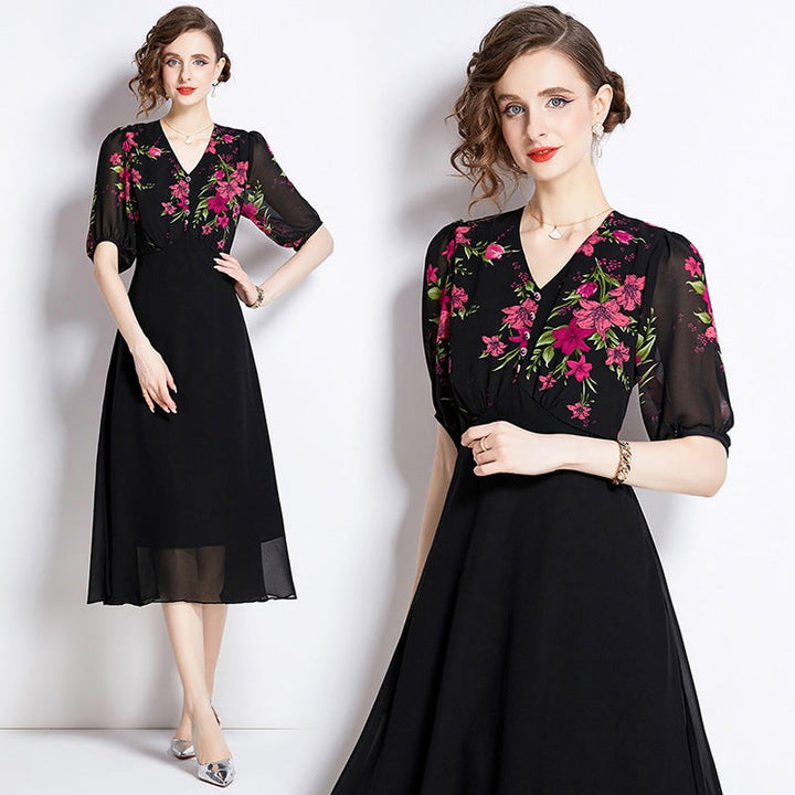 Elegant black chiffon dress with floral pattern, classic retro design, high waist, mid-length.