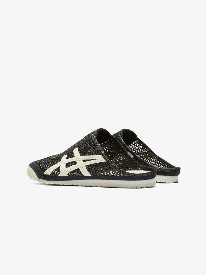 حذاء Onitsuka Tiger MEXICO 66 SABOT أسود شبكي كلاسيكي مفتوح الخلفية مع شعار جانبي أبيض.