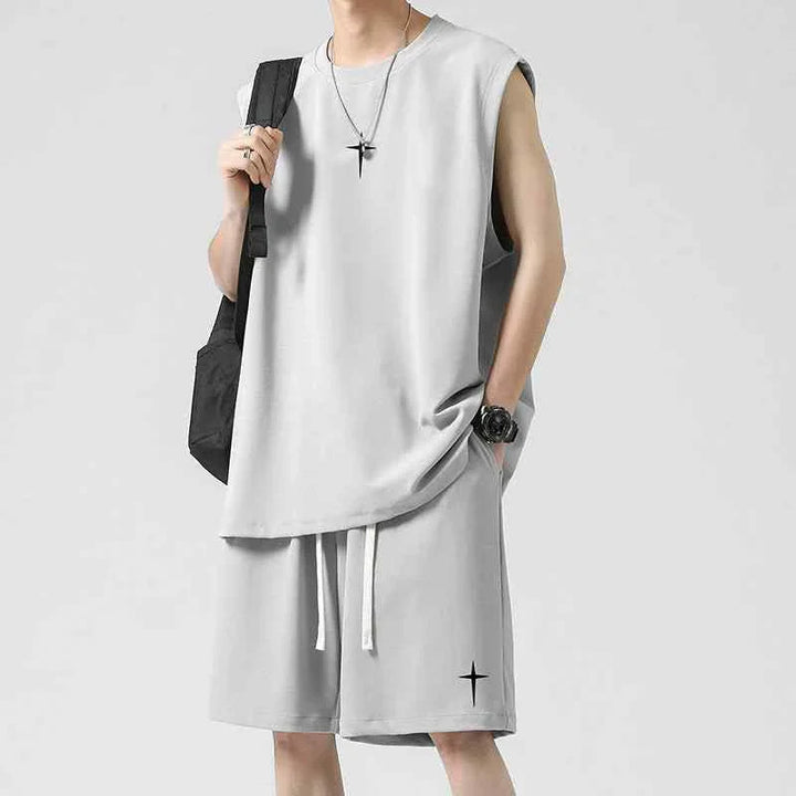 Men's sleeveless summer set in light gray ice silk fabric with loose fit and adjustable shorts.