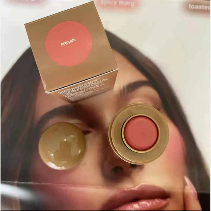 Rhode Pocket Blush Stick in Spicy Marg shade with compact gold packaging for cheeks and lips.