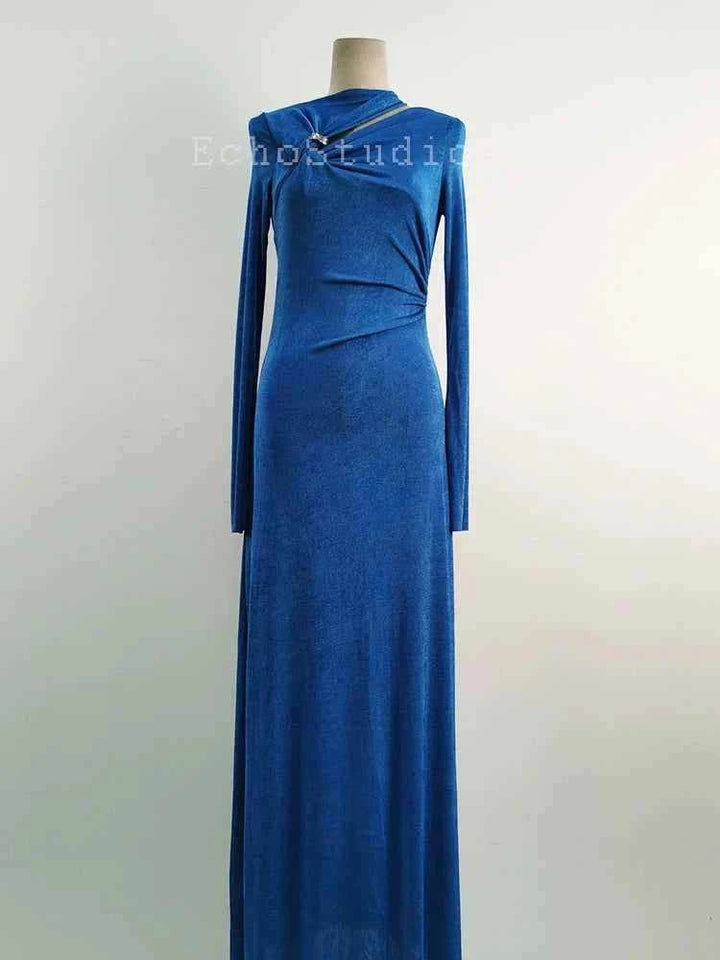 blue long sleeve evening maxi dress with asymmetrical neckline and draped waist detail