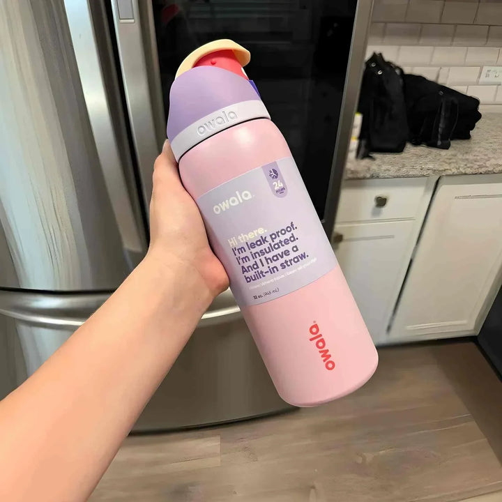 Owala FreeSip pink insulated water bottle with built-in straw and leak-proof design, cute edition for office, school, or travel use