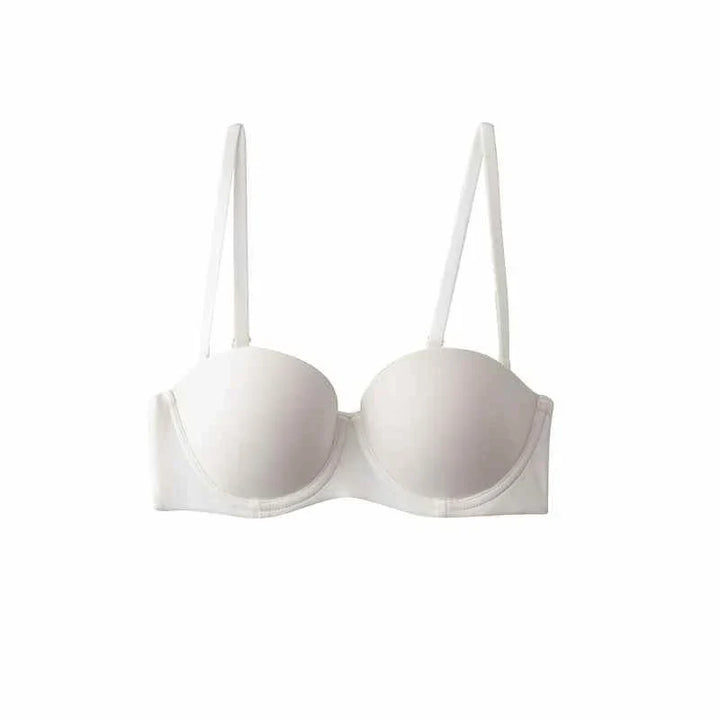 SKIMS Kardashian Women's half cup bra in white with detachable straps and lightweight fabric for natural shape and comfortable support