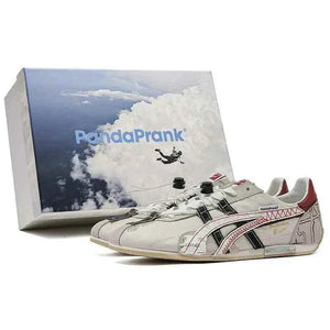 حذاء رياضي Onitsuka Tiger PandaPrank بتصميم عصري أبيض وأسود.