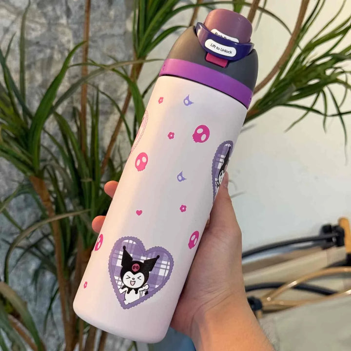 Owala FreeSip water bottle Cute Edition with dual drinking spout and leak-proof design in pink with cartoon character graphics