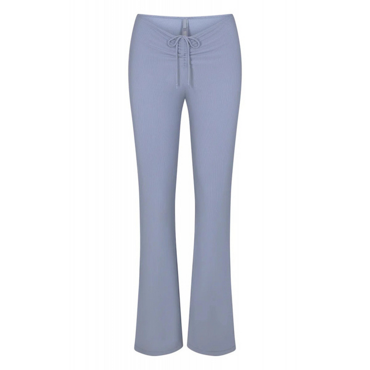SKIMS wide leg lounge pants with adjustable drawstring waist in soft blue fabric