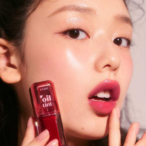 تينت شفايف زيتي ETUDE Oil Tint لترطيب فائق ولمعان زجاجي.