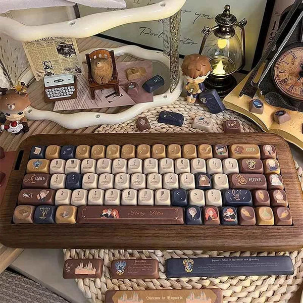Harry Potter-themed keyboard keycaps set with warm brown, cream, and dark blue colors featuring magical icons and characters, leather-like oil-resistant texture, customized design.