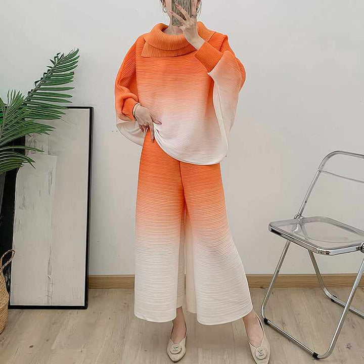 Pleated gradient suit, comfortable spring outfit in warm tones.