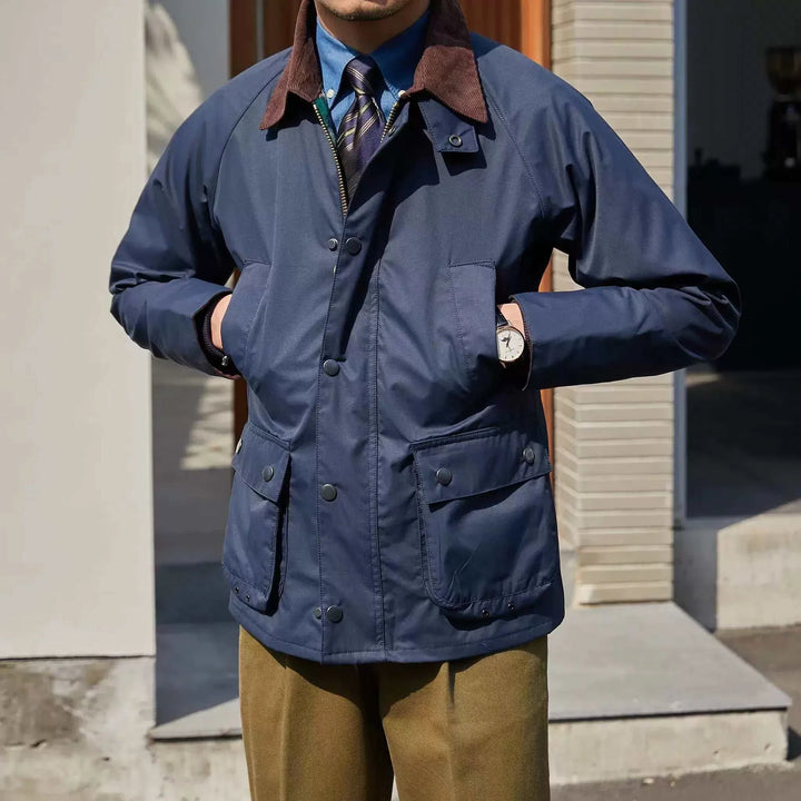 Mr. Lusan Jacket retro windproof hunting suit with brown velvet collar and navy exterior, featuring wide front pockets and striped lining.