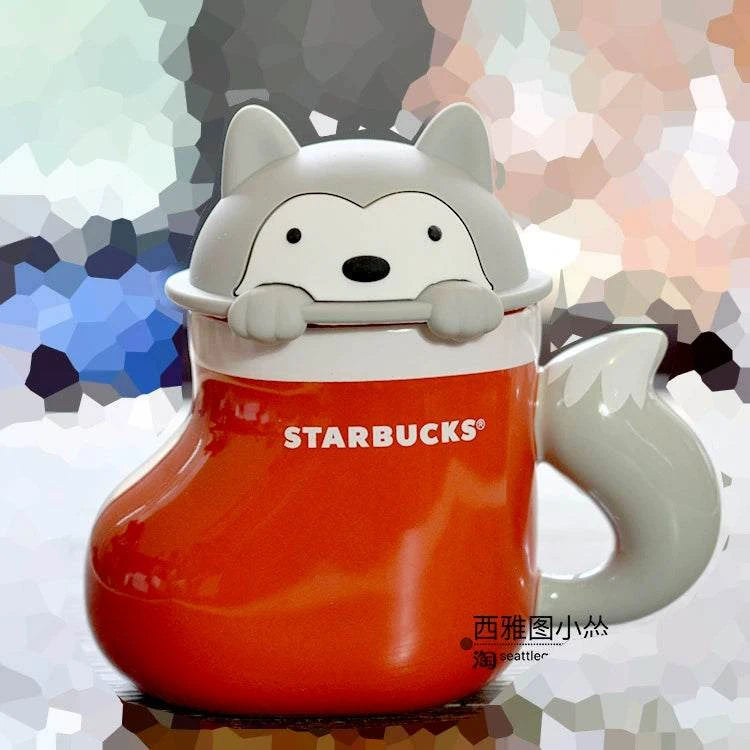 كوب Starbucks سيراميك بتصميم ثعلب باللون البرتقالي.