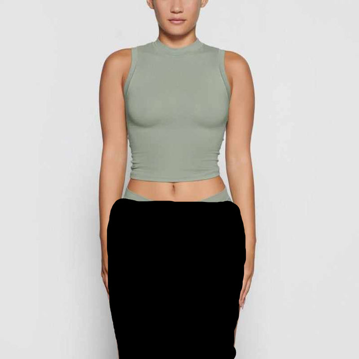 SKIMS sleeveless mock neck tank top in soft stretchy fabric, stylish and versatile basic top.