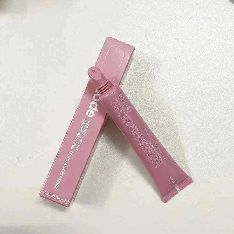 Rhode Skin مرطب شفاه ملون للترطيب والحماية البشرة.