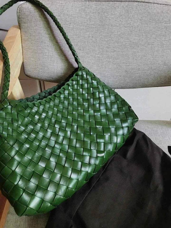 green dragon woven bag made of natural cow leather with braided handle and spacious design