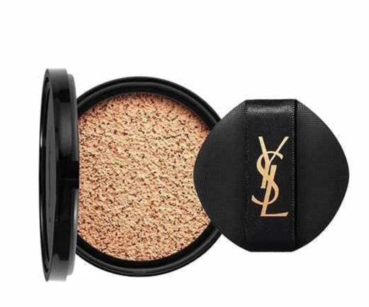 YSL Cushion Foundation in shade 20 with a black compact and gold logo, providing natural radiant coverage.