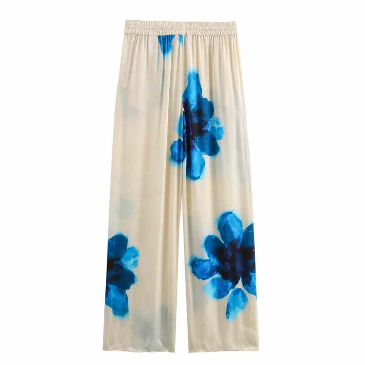 Silk women's set with blue floral prints on wide-leg pants.