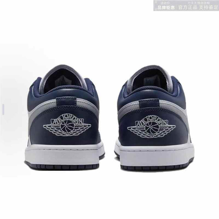 Air Jordan 1 Low in White/Midnight Navy/Wolf Grey, back view.