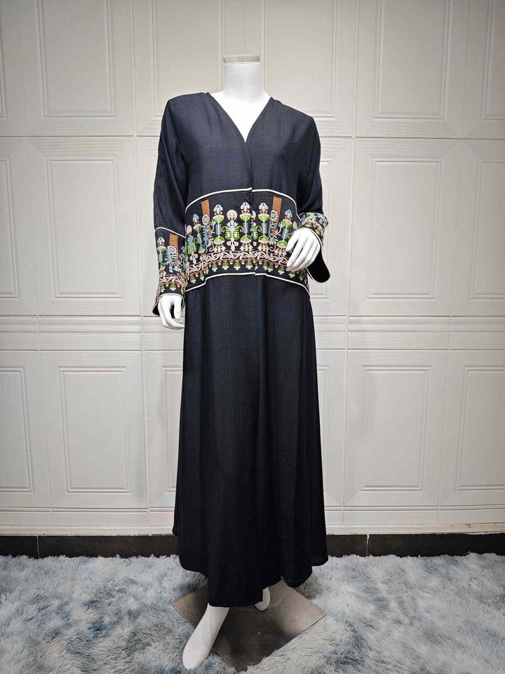 Elegant abaya with modern traditional embroidery, wide flowing design, perfect for special occasions and everyday wear.