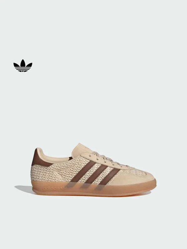Beige and brown Adidas Originals Gazelle Indoor sneaker with suede and canvas upper and honey-colored translucent sole.
