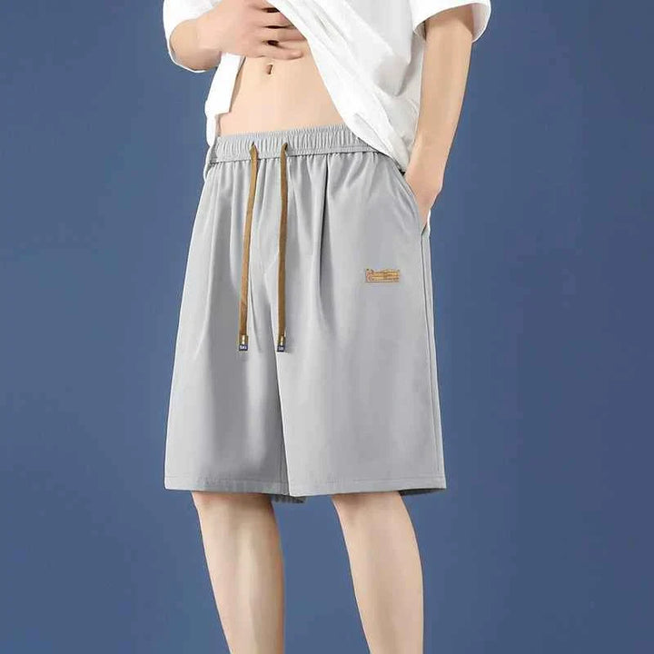 Men's gray Ice Silk shorts with adjustable waistband and side pockets, lightweight and breathable for summer comfort
