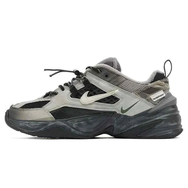 Nike × PandaPrank limited edition sneaker in gray, black, green, and white with durable materials and a sturdy black sole.