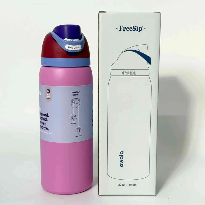 Owala FreeSip pink insulated water bottle with spill-proof dual drinking spout and cute character design, 32oz capacity