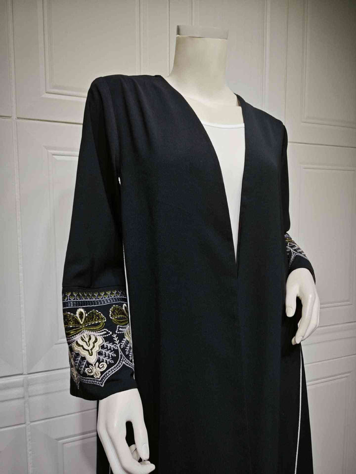 Elegant black embroidered sleeve Abaya with gold details, perfect for formal and casual occasions.