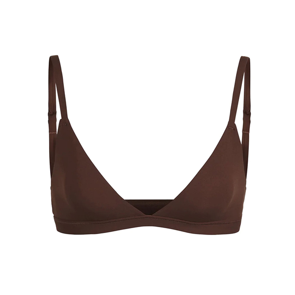 SKIMS brown triangle bralette with adjustable straps and soft, stretchy fabric for light support and everyday comfort