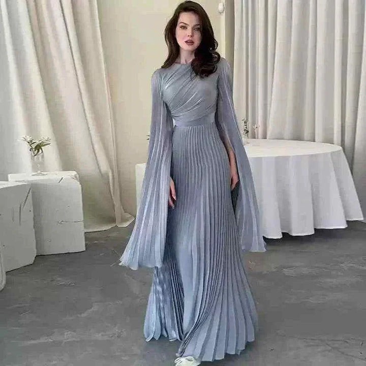 Elegant pleated gown with wide sleeves for evening party.