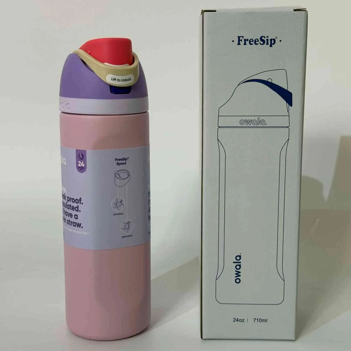 Owala Thermos CupKitty Limited Edition stainless steel insulated bottle with FreeSip dual drinking spout in pink and purple.
