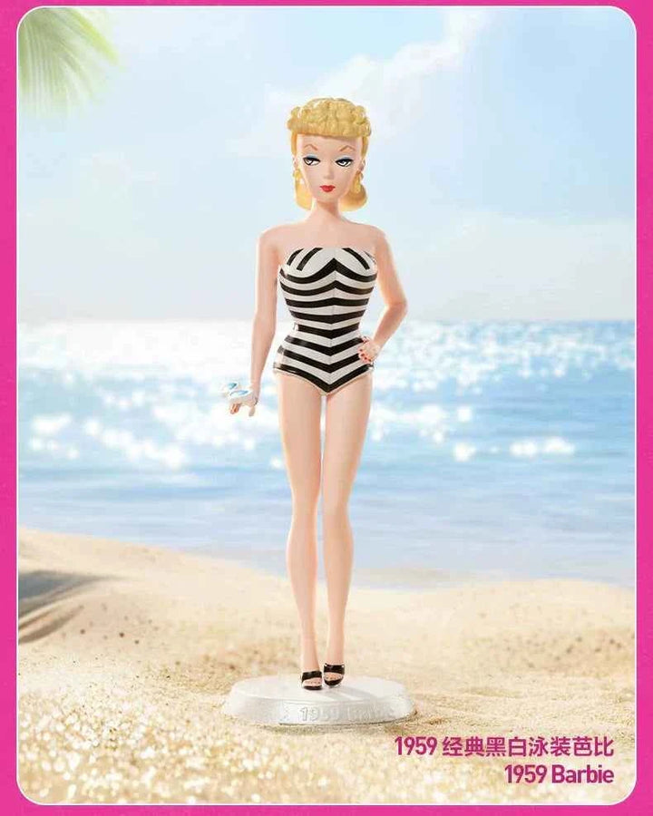 Barbie Fashion Series figurine in a classic 1959 striped swimsuit on a beach backdrop.
