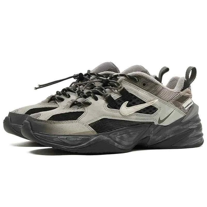 Limited edition Nike × PandaPrank sneakers in gray, black, green, and white with durable materials and modern street style design