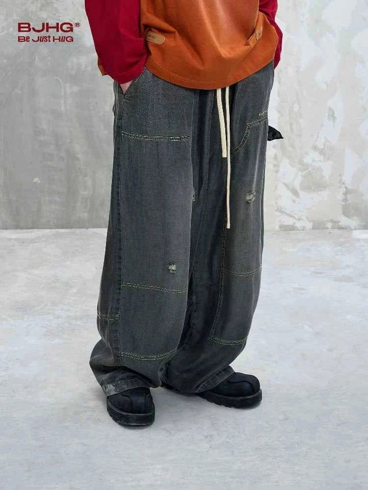wide street style jeans with faded wash and loose fit for casual fashion