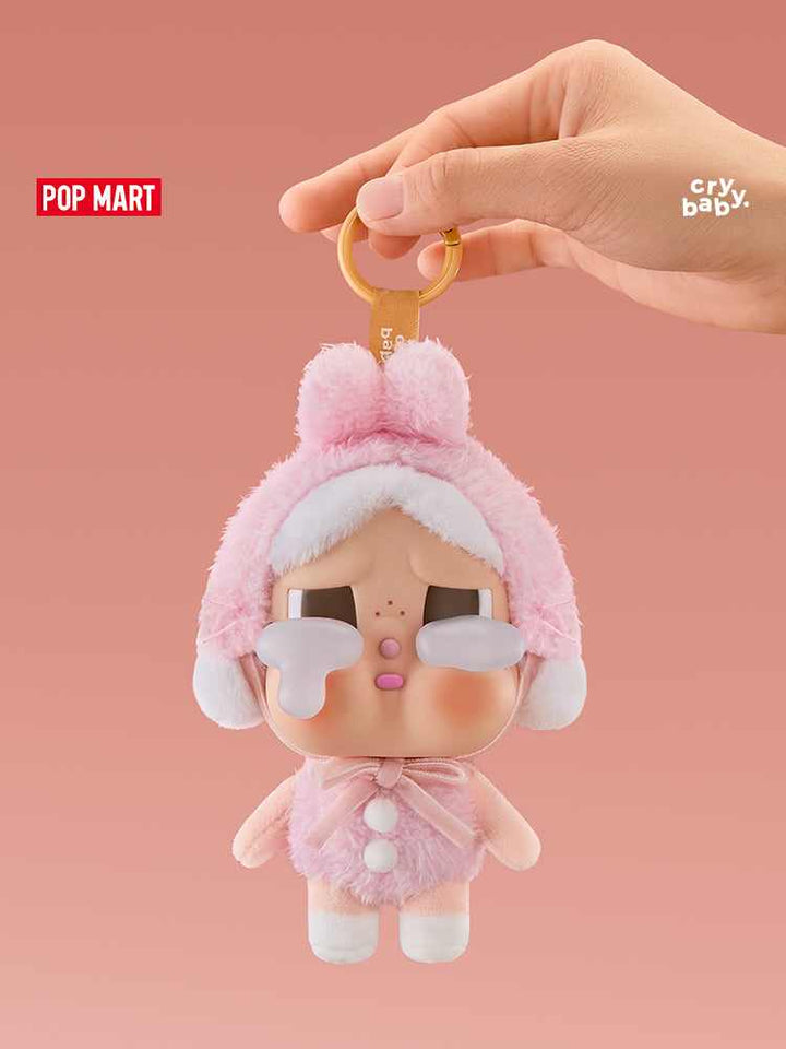 POP MART Crybaby plush doll in pink bunny costume keychain.