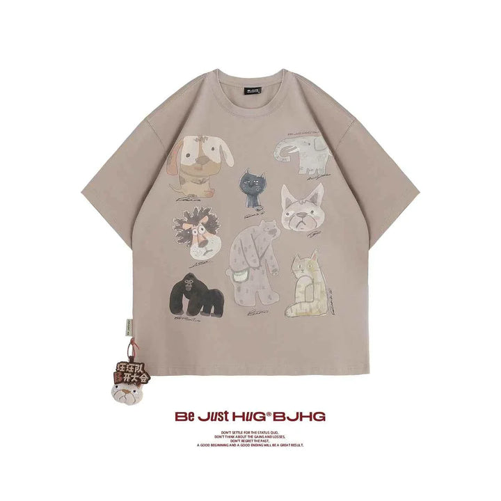 Light brown casual t-shirt with cartoon animal prints including dog, cat, elephant, and gorilla designs.