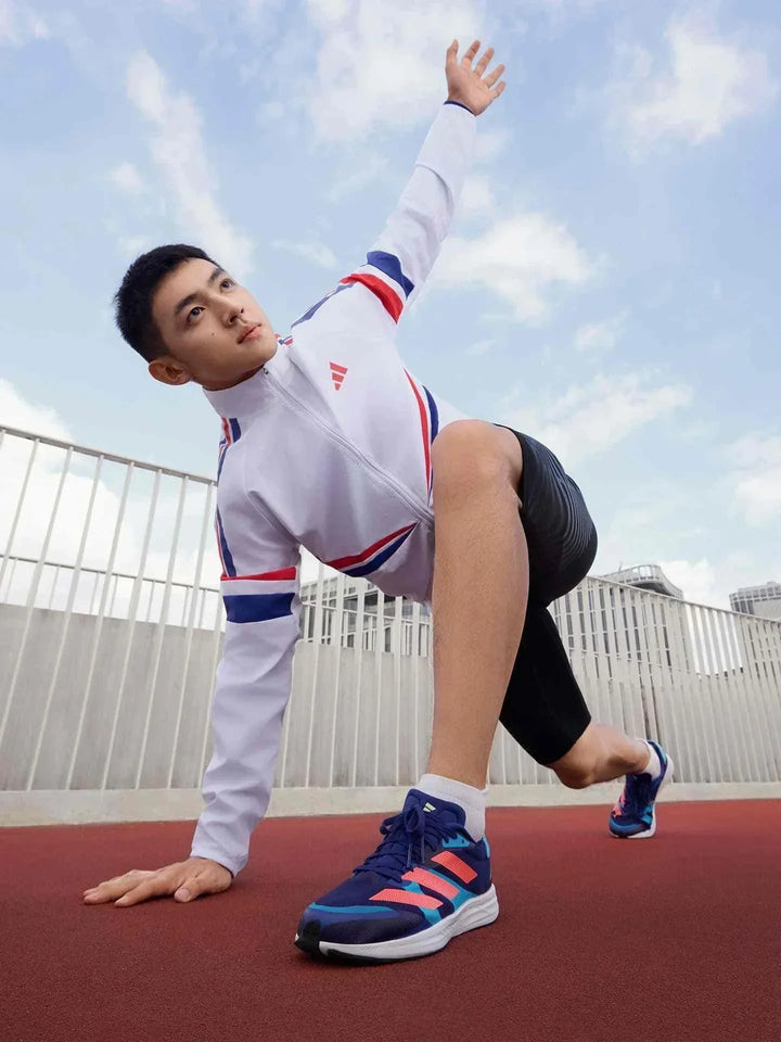 Adidas | أديداس حذاء Adizero RC 4 أزرق ورياضي للجري مع تصميم شبكي خفيف الوزن