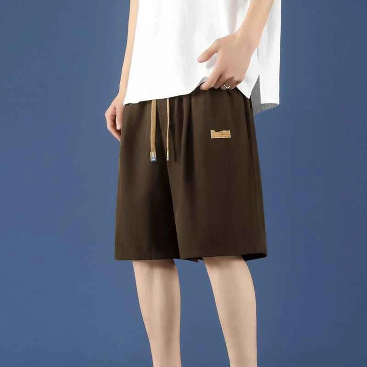 Men's Ice Silk casual shorts in brown with adjustable waistband and soft, breathable fabric
