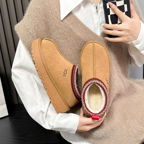 The new snow boots women's short tube thick-soled ethnic style low-top leather weaving slip-on thickened and heightened warm cotton shoes