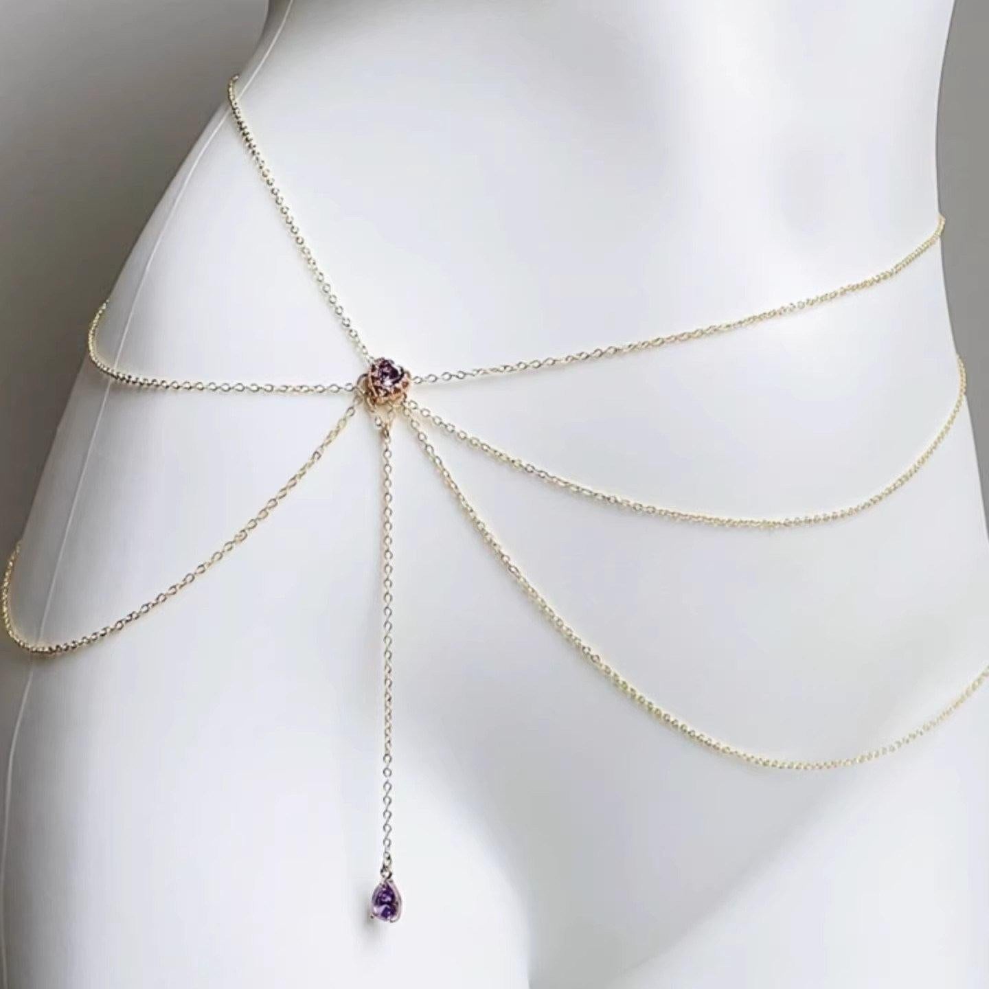 سلسلة خصر Body Chain ذهبية بتصميم عصري مع حجر Purple Stone.