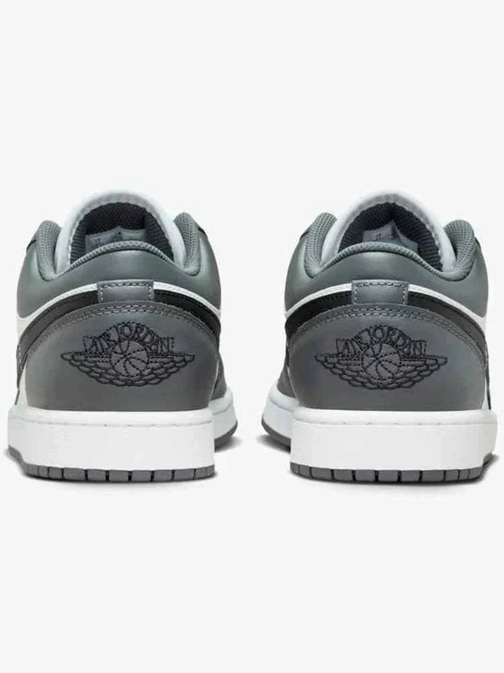 Nike men's Air Jordan 1 shoes in Iron Gray, featuring rubber sole and classic design.