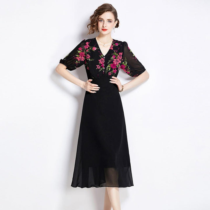 Elegant black chiffon dress with floral pattern, featuring sheer puff sleeves and mid-length retro slim fit.