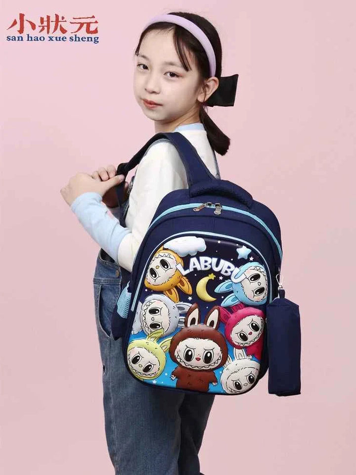 Child wearing a navy blue LABUBU cartoon backpack with colorful character designs and a matching pencil case