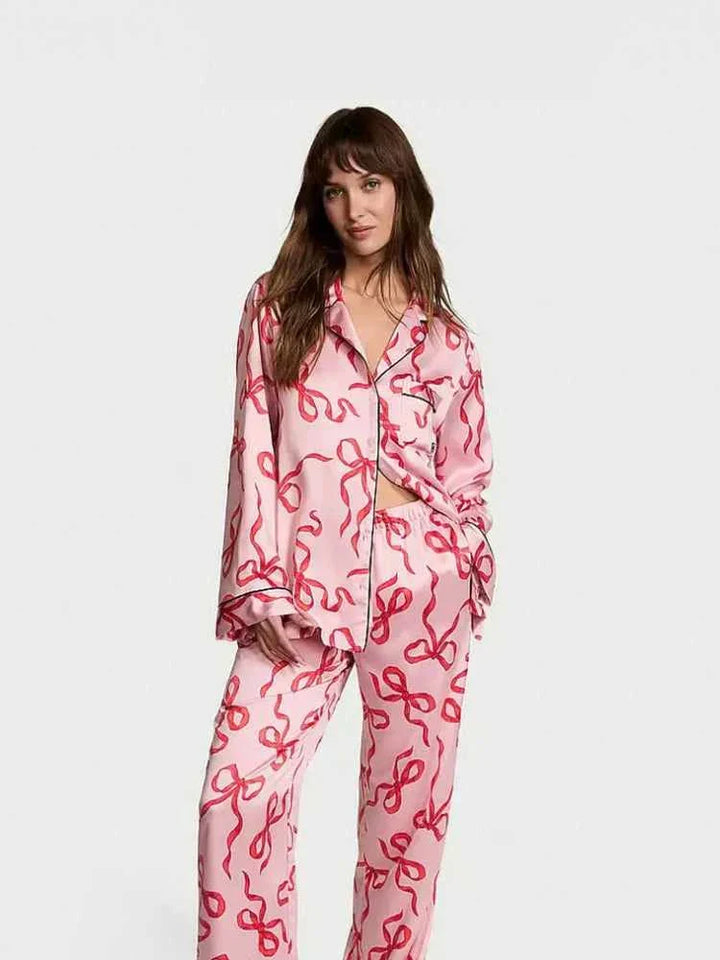 Victoria's Secret Show Series pink satin long sleeve pajama set with red ribbon print for women, styled for summer outside wear