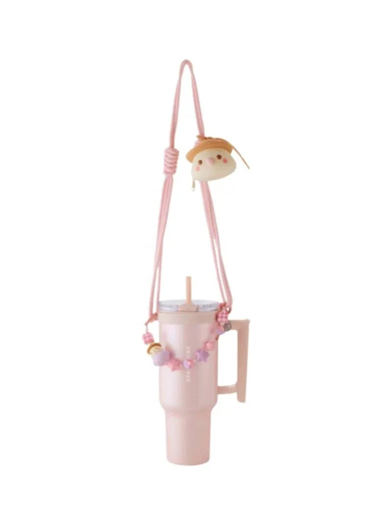 كوب Starbucks Tumbler وردي بمقبض وحزام للكتف.