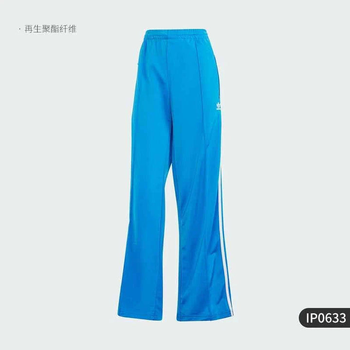 Blue Adidas original sporty pants with white stripes and zipper pockets for comfortable movement and daily activities